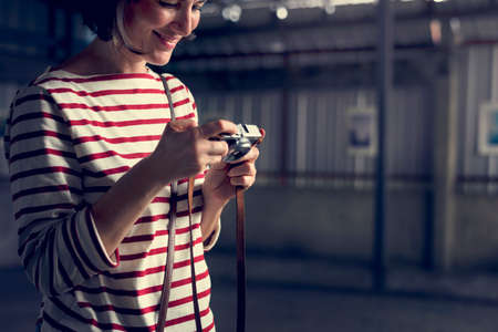 Woman traveler photographer holiday lifestyle trip