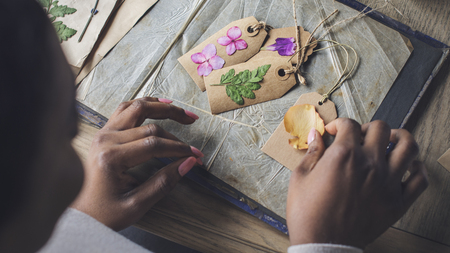 Woman creates pressed flower art
