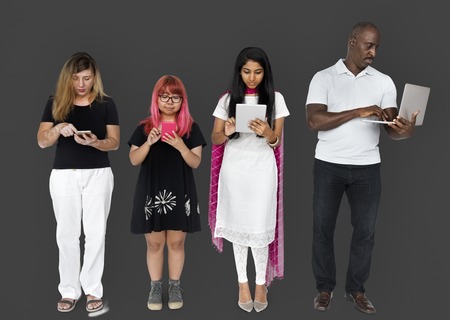 Group of people using digital devices technology
