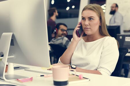 Woman working with computer at the office