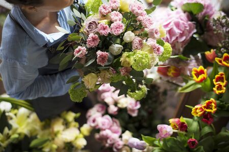 Florist Making Fresh Flowers Bouquet Arrangement