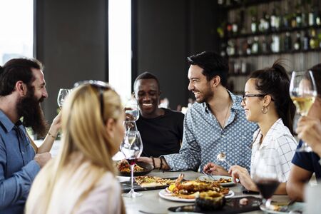 People having meal together in the restaurant