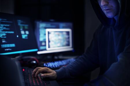 Hacker man working on computer