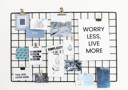 Postcard and placard on white wall design