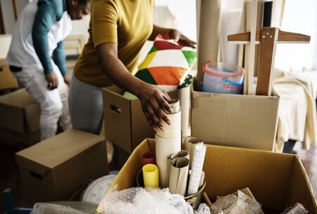 Photo for Black family moving in to their new house - Royalty Free Image