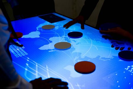 People brainstorming together at cyber space table