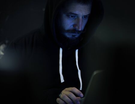 Hacker working on computer cyber crime