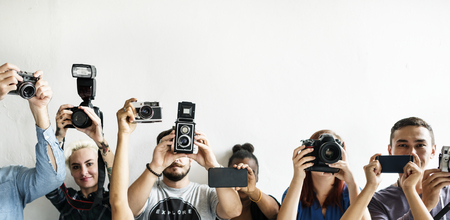Reportage holding a recorder equipment in a line