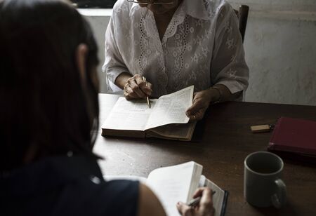 Group of christianity people reading bible together