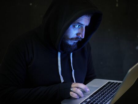 Hacker working on computer cyber crime