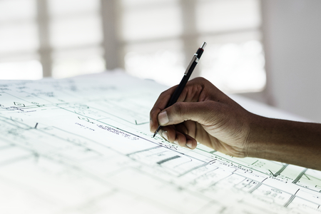 Close up of hands working on paperwork