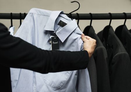 Customer checking out clothes