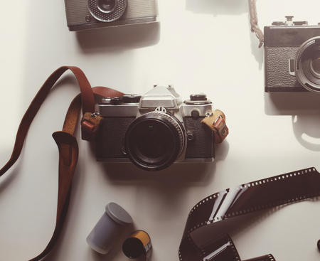 Flat lay of vintage analog cameras