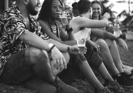 Diverse group of people enjoying a road trip and festival