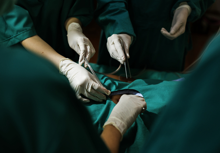 Doctors doing an operation
