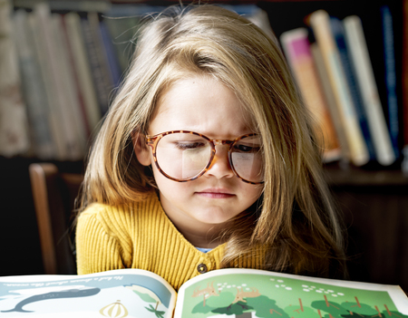 Adorable Cute Girl Reading Storytelling Concept