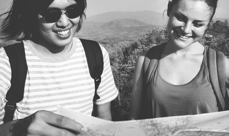 Friends checking the map for directions