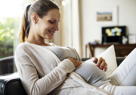 A cheerful pregnant woman