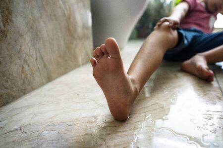 young boy slipped in the toilet