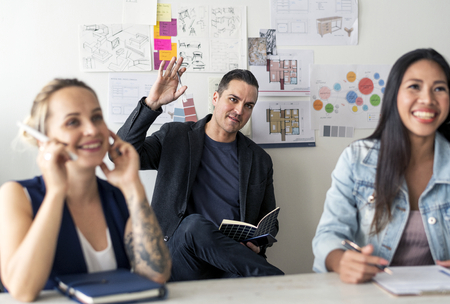 Diverse people in startup business meeting