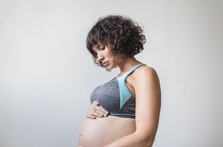 Pregnant woman doing light exercise