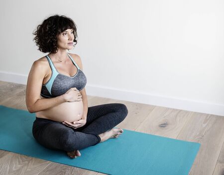 Pregnant woman doing light exercise