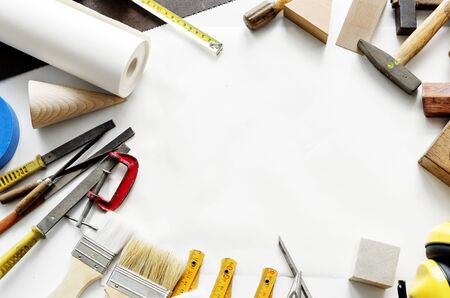 Flat lay of various technician tools isolated on white background