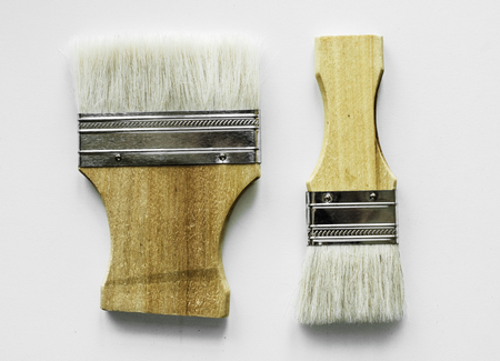 Flat lay of brushes isolated on white background