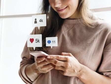 Woman using a smarphone social media conecpt