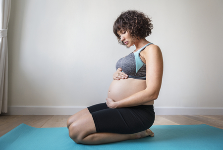 Pregnant woman doing light exercise