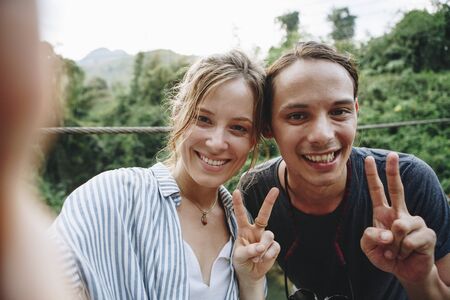 Couple having their photo taken in nature