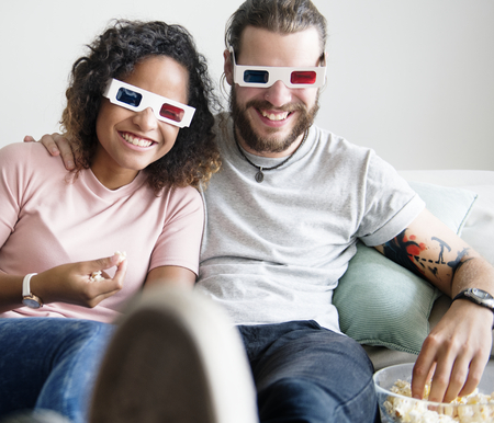 Couple watching 3D movie together