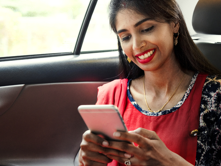 Indian woman using mobile phone
