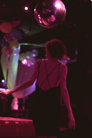 Woman on the dance floor of a club