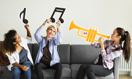 Group of people enjoying music icons