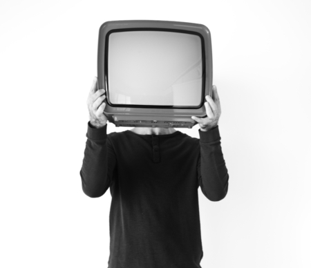 Closeup of man holding a TV