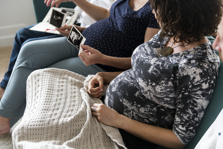 Pregnant support group meetup in a house
