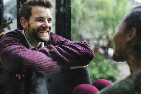 Cheerful young couple is talking