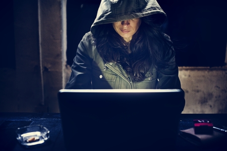 Hacker working on computer cyber crime