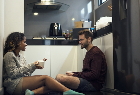 Couple together in the kitchen