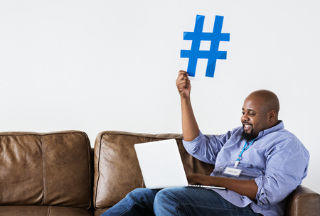 Black man working on laptop