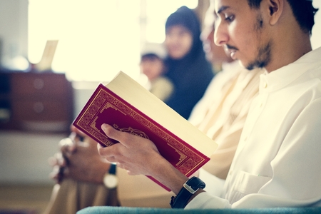 Muslims reading from the quran