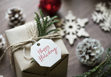 Happy holiday tag on a Christmas gift box