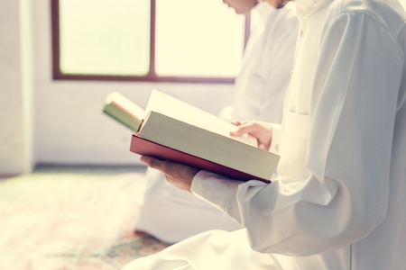 Muslims reading from the quran