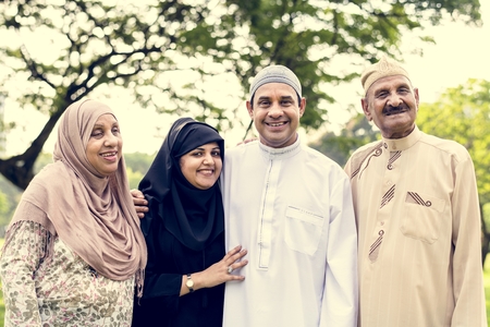 Muslim family having a good time outdoors
