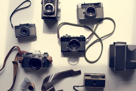 Flat lay of vintage analog cameras
