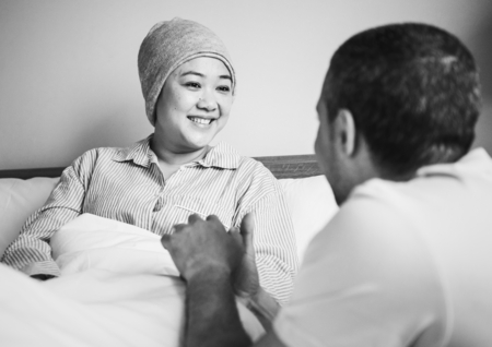 Husband supporting a sick wife
