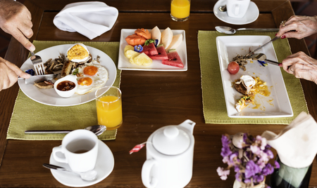 Family eating breakfast at a hotel