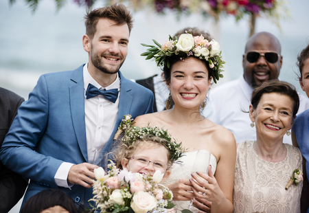 Young couple in a wedding ceremony at the beach