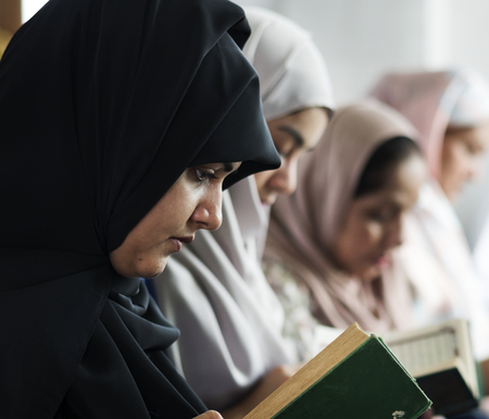 Muslims reading from the quran